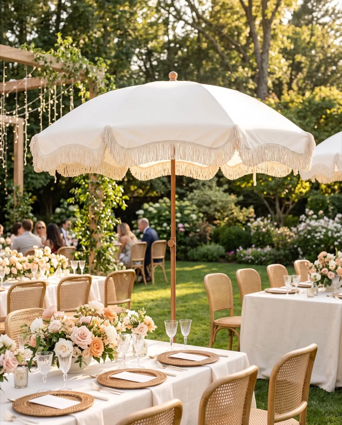 White Fringe Beach Umbrella styled at an event